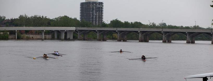 Four boats rowing on Zink Lake in Tulsa